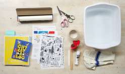 An overhead image of all the materials necessary to make stickers using packing tape and printed source material from Courtney Cerrito's DIY sticker class on Creativebug