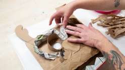 A  paper mache masks made by Katrina Wheeler in her Make a Paper Mache Dragon Head class on Creativebug
