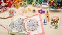 A close-up image of Rebecca Ringquist's Spring Fling Embroidery Sampler taught in her class on Creativebug.