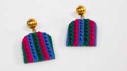 Multicolored earrings being made by Faheema Chaudhury in her Make Faux Knit Dangle Earrings with Polymer Clay class on Creativebug.