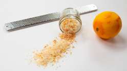 A zester, an orange, and citrus salt made by Lorene Edwards Forkner in her Gather and Make: Four Garden Projects class on Creativebug.