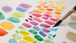 A rainbow of watercolor paint swatches made in David Tenorio's Essential Color Mixing class on Creativebug
