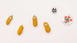 A collection of handmade DIY bag charms made by Twinkie Chan in her Creativebug class Bag Charm Party: 25 Baubles For Your Bags