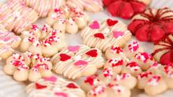 A selection of decorated Spritz cookies made in The Wilton Method: Spritz Cookies class on Creativebug.