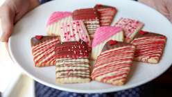 A selection of decorated Spritz cookies made in The Wilton Method: Spritz Cookies class on Creativebug.