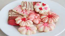 A selection of decorated Spritz cookies made in The Wilton Method: Spritz Cookies class on Creativebug.