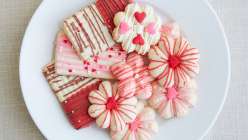 A selection of decorated Spritz cookies made in The Wilton Method: Spritz Cookies class on Creativebug.