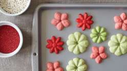 A selection of decorated Spritz cookies made in The Wilton Method: Spritz Cookies class on Creativebug.