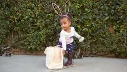 Annabel Wrigley teaches this class to make a natural-colored canvas and pink felt basket in this Easter craft class. This basket features a stitched bunny face, big floppy ears and is a great spring craft idea for kids.