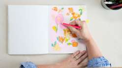 Learn how to paint a watercolor background and react to the paint with responsive drawing using brush tip markers, gelly roll pens and Uniball pens.